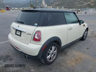 2011 MINI Hardtop with VIN WMWSU3C50BT093428, listed as a IAAI auction lot 41895788 with 173,501 mi miles and . Bid and sale history available at DreamBid. Image 4.