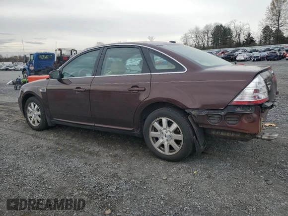 2009 Ford Taurus SE with VIN 1FAHP23W89G125025, listed as a Copart auction lot 80710004 with 114,176 mi miles and Salvage Title. Bid and sale history available at carsss.com. Image 2.