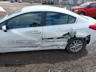 2014 Kia Forte EX with VIN KNAFX4A8XE5050378, listed as a IAAI auction lot 41923798 with 104,712 mi miles. Bid and sale history available at carsss.com. Image 6.