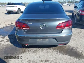 2014 Volkswagen CC R-Line with VIN WVWBN7AN1EE518173, listed as a IAAI auction lot 40895187 with 133,960 mi miles. Bid and sale history available at carsss.com. Image 16.