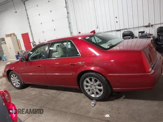 2009 Cadillac DTS w/1SA with VIN 1G6KD57Y59U149387, listed as a IAAI auction lot 41957750 with 94,939 mi miles. Bid and sale history available at carsss.com. Image 14.