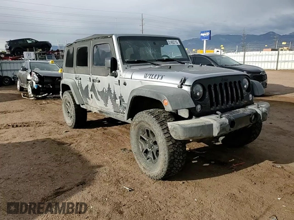 2015 Jeep Wrangler Unlimited Willys Wheeler with VIN 1C4BJWDG7FL690952, listed as a Copart auction lot 51493715 with 45,497 mi miles and Salvage Title. Bid and sale history available at DreamBid. Image 12.