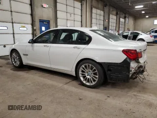 2015 BMW 7 Series 750i xDrive with VIN WBAYB6C54FD965787, listed as a Copart auction lot 89061355 with 104,633 mi miles and Salvage Title. Bid and sale history available at carsss.com. Image 2.