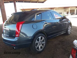 2014 Cadillac SRX Premium Collection z VIN 3GYFNDE31ES653114, wystawiony jako IAAI lot #42107858 z przebiegiem 125 192 mil mil oraz . Historia ofert i sprzedaży dostępna na DreamBid. Obrazek 4.