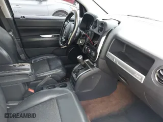 2014 Jeep Compass Latitude with VIN 1C4NJCEB7ED651270, listed as a IAAI auction lot 41561557 with 208,874 mi miles. Bid and sale history available at carsss.com. Image 5.