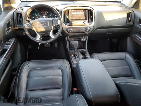 2021 GMC Canyon 4WD Denali with VIN 1GTG6EEN4M1130779, listed as a Copart auction lot 82695044 with 38,662 mi miles and Salvage Title. Bid and sale history available at carsss.com. Image 8.