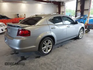 2014 Dodge Avenger SXT z VIN 1C3CDZCBXEN234910, wystawiony jako IAAI lot #42399464 z przebiegiem 152 026 mil mil oraz . Historia ofert i sprzedaży dostępna na DreamBid. Obrazek 4.
