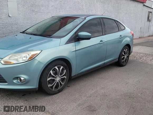 2012 Ford Focus SE с VIN 1FAHP3F22CL279808, выставлен на аукционе Copart как лот 60678735 с пробегом 138 973 миль миль и Чистый • Clean title. История ставок и продаж доступна на DreamBid. Изображение 2.