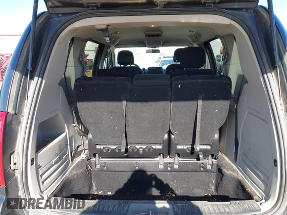 2011 Dodge Grand Caravan SXT with VIN 2D4RN4DGXBR765249, listed as a IAAI auction lot 41097760 with 95,481 mi miles and . Bid and sale history available at DreamBid. Image 16.