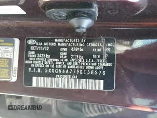 2013 Kia Optima EX z VIN 5XXGN4A77DG138576, wystawiony jako Copart lot #57203965 z przebiegiem 201 406 mil mil oraz Szkoda całkowita • Salvage title. Historia ofert i sprzedaży dostępna na DreamBid. Obrazek 13.