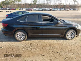 2019 Volkswagen Jetta S z VIN 3VWCB7BU6KM144584, wystawiony jako IAAI lot #41963870 z przebiegiem 205 028 mil mil oraz . Historia ofert i sprzedaży dostępna na DreamBid. Obrazek 13.