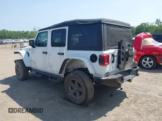 2018 Jeep Wrangler Unlimited Sport S with VIN 1C4HJXDGXJW146873, listed as a IAAI auction lot 42404813 with 73,929 mi miles and . Bid and sale history available at DreamBid. Image 3.
