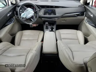 2021 Cadillac XT4 FWD Premium Luxury with VIN 1GYFZCR41MF043072, listed as a Copart auction lot 74430824 with 31,053 mi miles and Salvage Title. Bid and sale history available at carsss.com. Image 8.