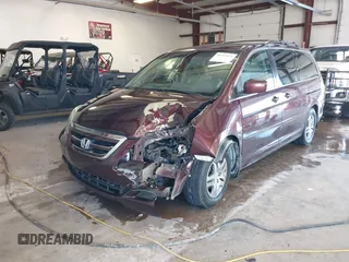 2007 Honda Odyssey EX-L with VIN 5FNRL38727B066885, listed as a IAAI auction lot 41317374 with 220,243 mi miles. Bid and sale history available at carsss.com. Image 2.