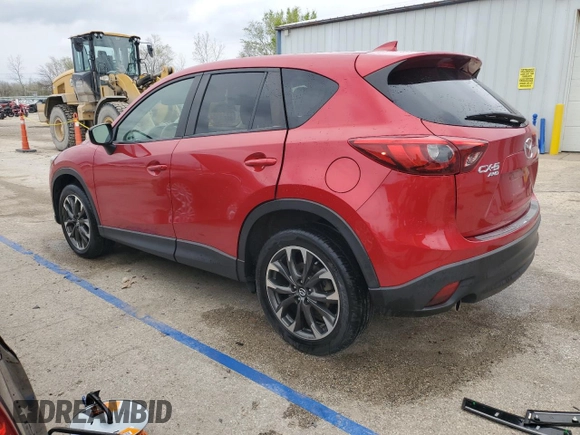 2016 Mazda CX-5 Grand Touring with VIN JM3KE4DY5G0660201, listed as a Copart auction lot 52165205 with 108,231 mi miles and Salvage Title. Bid and sale history available at DreamBid. Image 2.