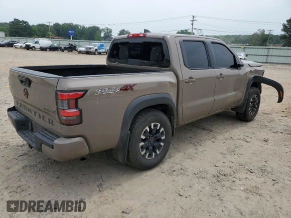 2023 Nissan Frontier Pro-4X with VIN 1N6ED1EK0PN617872, listed as a Copart auction lot 57125435 with 97,981 mi miles and Salvage title. Bid and sale history available at DreamBid. Image 3.