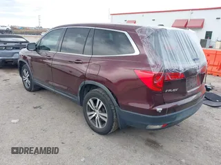 2016 Honda Pilot EX-L with VIN 5FNYF5H58GB026209, listed as a IAAI auction lot 41333088 with 129,484 mi miles and . Bid and sale history available at DreamBid. Image 3.