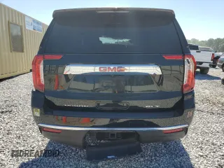 2023 GMC Yukon XL SLT with VIN 1GKS2GKDXPR254627, listed as a Copart auction lot 59226594 with 39,428 mi miles and Salvage Title. Bid and sale history available at DreamBid. Image 6.
