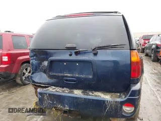 2006 GMC Envoy SLE z VIN 1GKDT13S862329493, wystawiony jako IAAI lot #41513303 z przebiegiem 118 355 mil mil oraz . Historia ofert i sprzedaży dostępna na DreamBid. Obrazek 16.