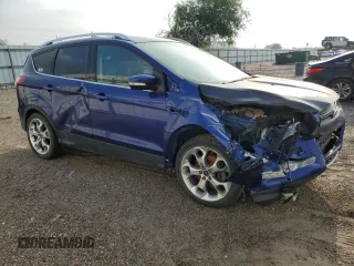 2016 Ford Escape Titanium with VIN 1FMCU9J95GUA75875, listed as a Copart auction lot 48929445 with 122,668 mi miles and Salvage Title. Bid and sale history available at DreamBid. Image 4.