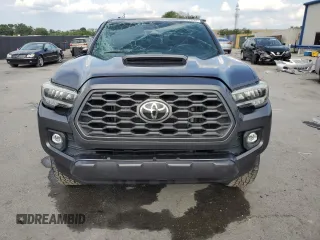 2020 Toyota Tacoma SR5 z VIN 3TYDZ5BN9LT000209, wystawiony jako Copart lot #56127875 z przebiegiem 92 350 mil mil oraz Szkoda całkowita • Salvage title. Historia ofert i sprzedaży dostępna na DreamBid. Obrazek 5.