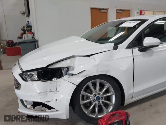 2017 Ford Fusion SE with VIN 3FA6P0H7XHR355914, listed as a IAAI auction lot 41983458 with 118,403 mi miles. Bid and sale history available at carsss.com. Image 6.