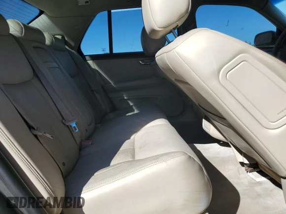 2006 Cadillac DTS 1SD z VIN 1G6KD57Y76U179888, wystawiony jako Copart lot #47218125 z przebiegiem 181 683 mil mil oraz Szkoda całkowita • Salvage title. Historia ofert i sprzedaży dostępna na DreamBid. Obrazek 10.