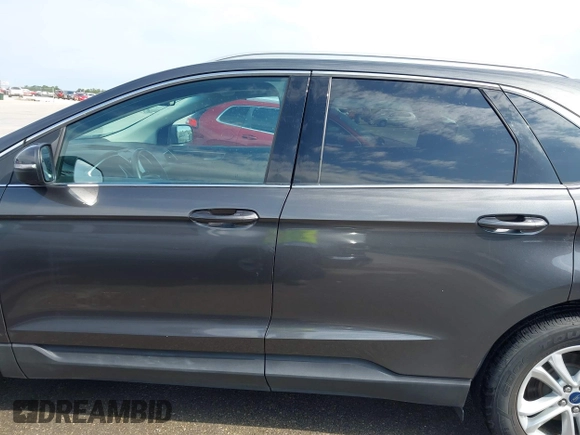 2020 Ford Edge SEL z VIN 2FMPK3J9XLBA54556, wystawiony jako IAAI lot #42179907 z przebiegiem 63 449 mil mil oraz . Historia ofert i sprzedaży dostępna na DreamBid. Obrazek 14.