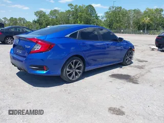 2021 Honda Civic Sport with VIN 2HGFC2F80MH527517, listed as a IAAI auction lot 42020871 with 36,058 mi miles and . Bid and sale history available at DreamBid. Image 4.