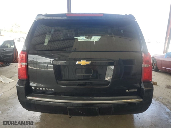 2017 Chevrolet Suburban Premier with VIN 1GNSKJKCXHR122234, listed as a Copart auction lot 45488545 with 80,607 mi miles and Salvage Title. Bid and sale history available at carsss.com. Image 6.