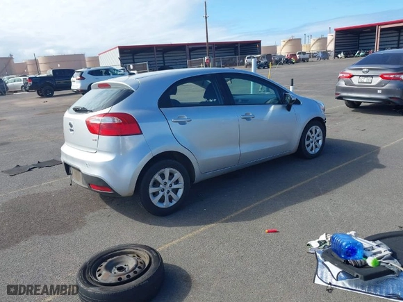 2012 Kia Rio LX with VIN KNADM5A34C6067453, listed as a IAAI auction lot 41489743 with 57,426 mi miles. Bid and sale history available at carsss.com. Image 4.