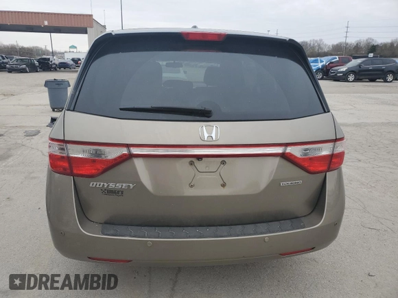 2012 Honda Odyssey Touring with VIN 5FNRL5H9XCB078399, listed as a Copart auction lot 52360165 with 174,819 mi miles and Salvage Title. Bid and sale history available at DreamBid. Image 6.