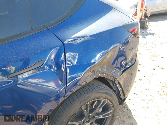 2024 Tesla Model Y Long Range with VIN 7SAYGDEE5RA329172, listed as a IAAI auction lot 41892147 with 8,030 mi miles and . Bid and sale history available at DreamBid. Image 21.