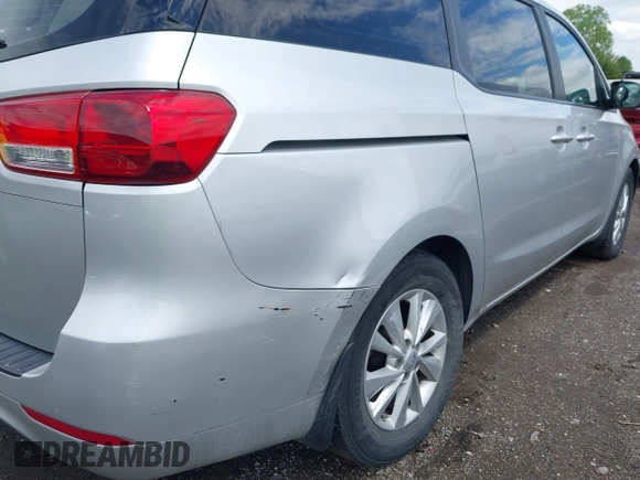 2016 Kia Sedona L with VIN KNDMA5C10G6182399, listed as a IAAI auction lot 42186358 with 102,874 mi miles and . Bid and sale history available at DreamBid. Image 6.