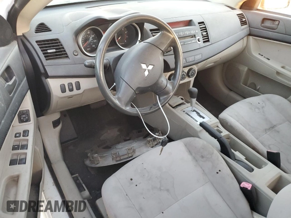 2010 Mitsubishi Lancer DE with VIN JA32U1FU2AU023608, listed as a Copart auction lot 77461714 with 132,895 mi miles and Salvage Title. Bid and sale history available at DreamBid. Image 8.