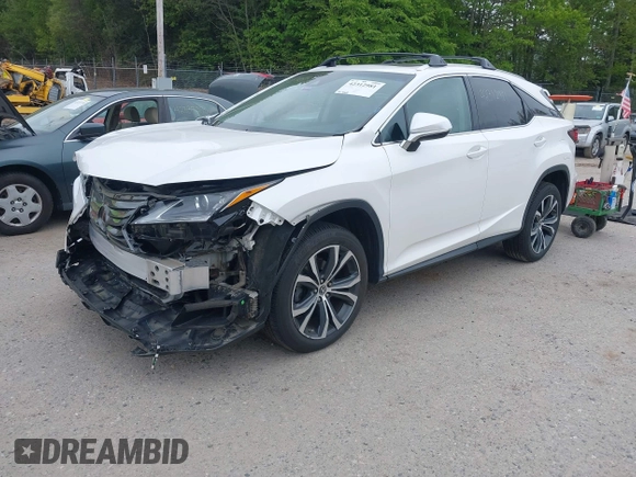2019 Lexus RX 350 with VIN 2T2BZMCA7KC169897, listed as a IAAI auction lot 42312981 with 35,864 mi miles and . Bid and sale history available at DreamBid. Image 2.