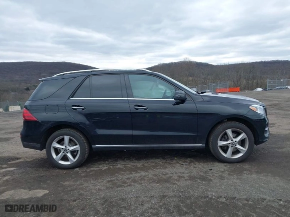 2018 Mercedes-Benz GLE with VIN 4JGDA5HB8JB037672, listed as a IAAI auction lot 41741405 with 116,560 mi miles. Bid and sale history available at carsss.com. Image 13.