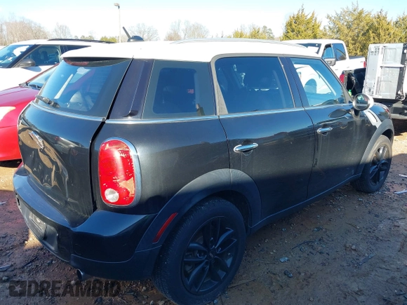 2015 MINI Countryman with VIN WMWZB3C59FWR44862, listed as a IAAI auction lot 41199254 with 94,074 mi miles and . Bid and sale history available at DreamBid. Image 4.