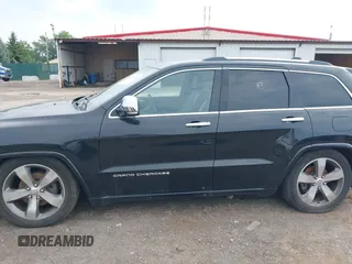 2015 Jeep Grand Cherokee High Altitude with VIN 1C4RJFCGXFC604663, listed as a IAAI auction lot 42816306 with 117,467 mi miles and . Bid and sale history available at DreamBid. Image 14.