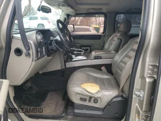 2004 Hummer H2 with VIN 5GRGN23U24H118230, listed as a Copart auction lot 87764075 with 202,206 mi miles and Salvage Title. Bid and sale history available at carsss.com. Image 7.