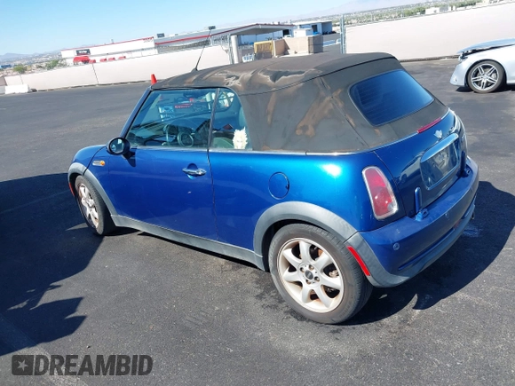 2007 MINI Convertible with VIN WMWRF33507TG16644, listed as a IAAI auction lot 40058098 with 163,215 mi miles and . Bid and sale history available at DreamBid. Image 3.
