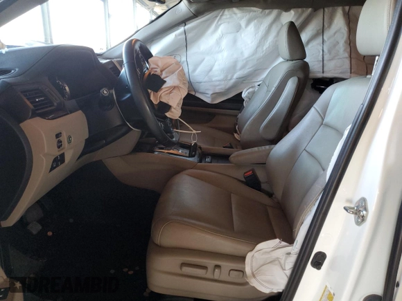 2018 Honda Pilot Touring с VIN 5FNYF6H98JB053524, выставлен на аукционе Copart как лот 61447785 с пробегом 114 942 миль миль и Списание • Salvage title. История ставок и продаж доступна на DreamBid. Изображение 7.