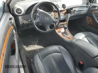 2004 Mercedes-Benz CLK 500 with VIN WDBTK75G04T005692, listed as a Copart auction lot 77038514 with 125,997 mi miles and Salvage Title. Bid and sale history available at DreamBid. Image 8.