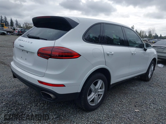 2017 Porsche Cayenne with VIN WP1AA2A23HKA89803, listed as a IAAI auction lot 41939952 with 79,239 mi miles. Bid and sale history available at carsss.com. Image 4.