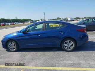 2020 Hyundai Elantra SEL z VIN 5NPD84LF1LH570792, wystawiony jako IAAI lot #42138863 z przebiegiem 27 768 mil mil oraz . Historia ofert i sprzedaży dostępna na DreamBid. Obrazek 14.