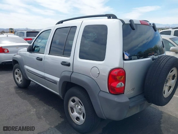 2003 Jeep Liberty Sport with VIN 1J4GL48KX3W674820, listed as a IAAI auction lot 41852729 with 246,363 mi miles. Bid and sale history available at carsss.com. Image 6.