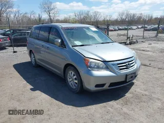 2009 Honda Odyssey EX-L with VIN 5FNRL38629B013033, listed as a IAAI auction lot 42034354 with 257,254 mi miles. Bid and sale history available at carsss.com. Image 1.