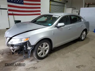 2010 Lincoln MKS with VIN 1LNHL9DR2AG611885, listed as a Copart auction lot 57954725 with 100,973 mi miles and Salvage title. Bid and sale history available at DreamBid. Image 1.