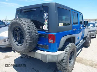 2016 Jeep Wrangler Unlimited Sport with VIN 1C4BJWDG2GL296485, listed as a IAAI auction lot 42177026 with 113,971 mi miles and . Bid and sale history available at DreamBid. Image 4.