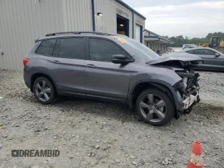 2021 Honda Passport Touring z VIN 5FNYF7H94MB005741, wystawiony jako Copart lot #57626664 z przebiegiem Nie podano mil oraz Szkoda całkowita • Salvage title. Historia ofert i sprzedaży dostępna na DreamBid. Obrazek 4.